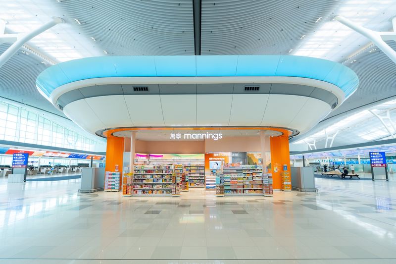 Mannings store at Hong Kong International Airport, retail architecture photography